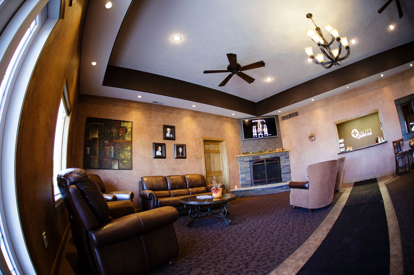 The bright, welcoming waiting room at Quality Urgent Care
